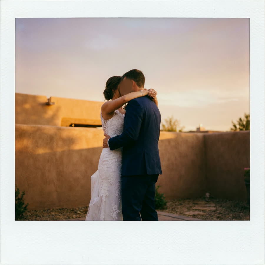 Instant print of a bride and groom dancing at a backyard wedding
